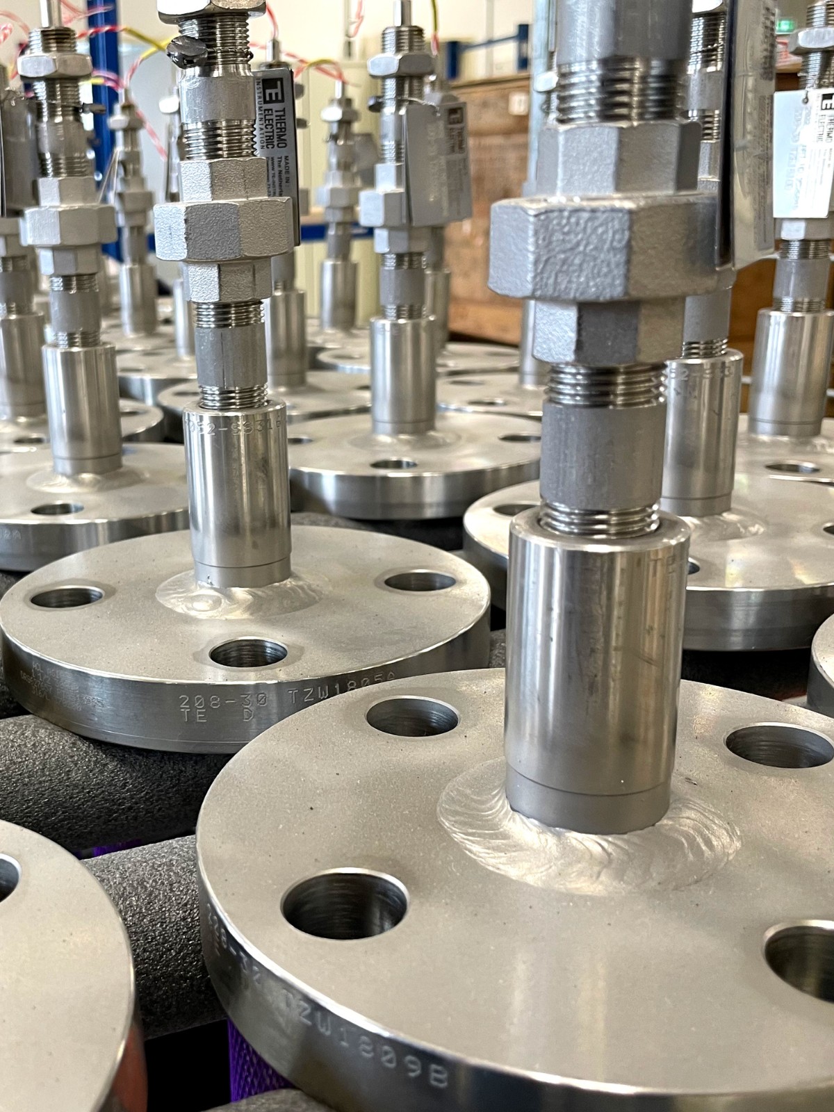 Resistance temperature detector sensor installed in refinery process line for oil and gas monitoring